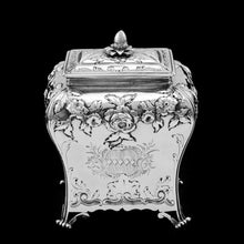 Load image into Gallery viewer, Antique Georgian Solid Sterling Silver Tea Caddy with Floral Embossed Design and Coat of Arms - Daniel Smith & Robert Sharp 1765