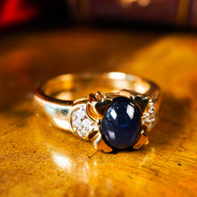 Load image into Gallery viewer, A Stylish Vintage 9K Gold Sapphire Cabochon and Diamond Ring
