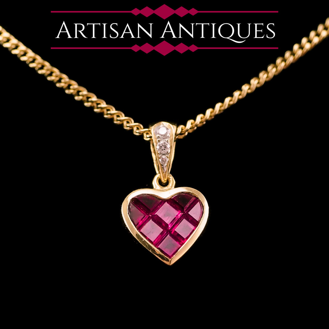 A Vintage Ruby & Diamond 18K Gold Heart Shaped Necklace
