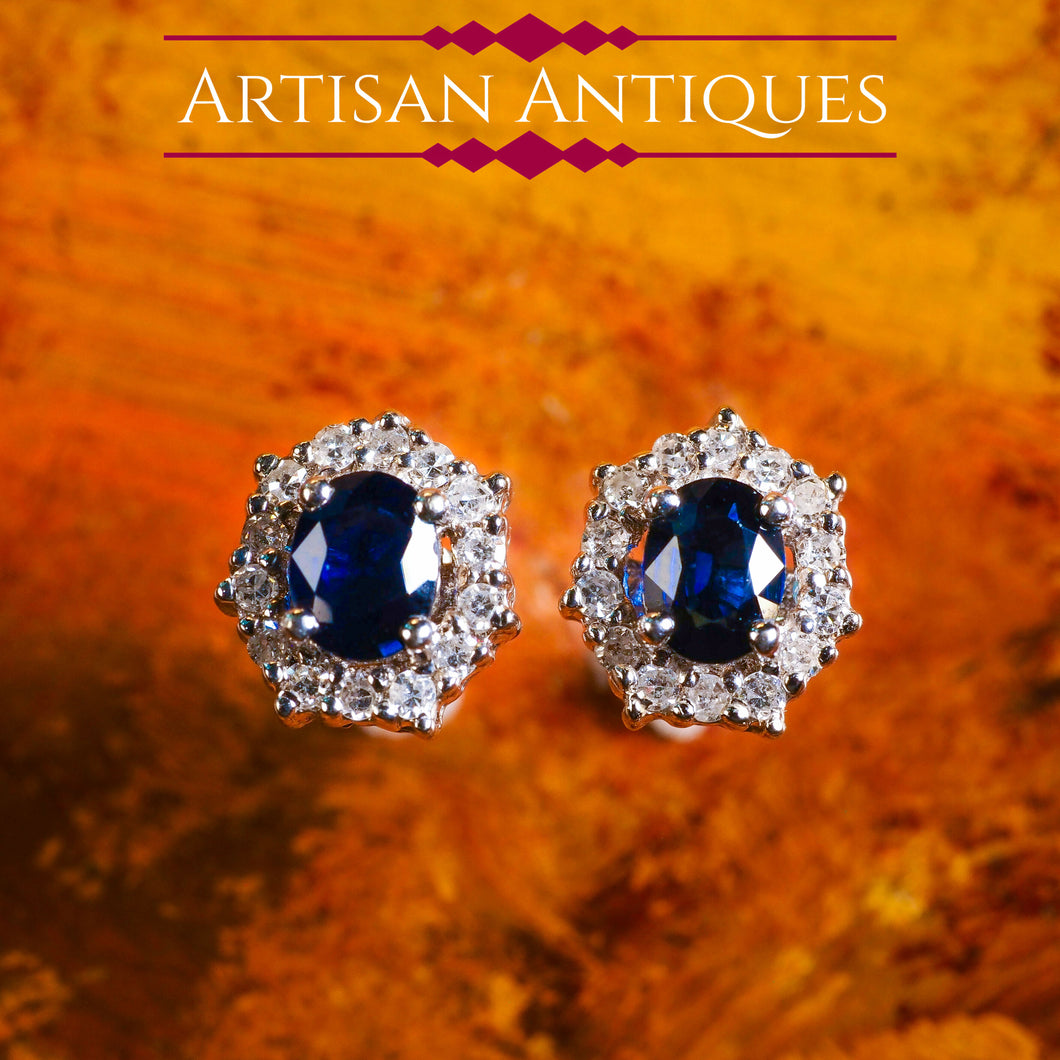 A Pair of Sapphire & Cluster Diamond Earrings 9K White Gold