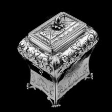 Load image into Gallery viewer, Antique Georgian Solid Sterling Silver Tea Caddy with Floral Embossed Design and Coat of Arms - Daniel Smith &amp; Robert Sharp 1765
