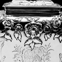 Load image into Gallery viewer, Antique Georgian Solid Sterling Silver Tea Caddy with Floral Embossed Design and Coat of Arms - Daniel Smith &amp; Robert Sharp 1765
