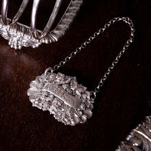 Load image into Gallery viewer, Antique Solid Silver Wine/Whisky Decanter Label with Bacchus &amp; Vine Motifs - Taylor &amp; Perry 1840

